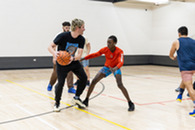 group of men playing basketball