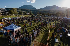 july first friday crowd with mountains in background