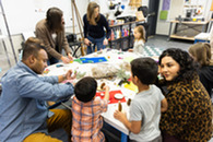 family making crafts at the Art Spot