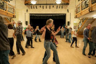 people dancing at a country western dance in the silverthorne pavilion