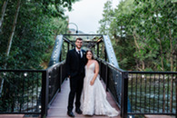 bridal couple by Silverthorne Pavilion bridge