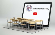Webinar Wednesday Videos ready to play via YouTube on a laptop with empty chairs around laptop for viewers