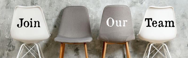 Image of 4 empty chairs with the words "Join our team" on three of them