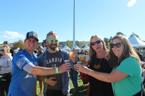 Friends holding beers