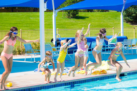 kids jump into pool