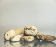 stone with word healing
