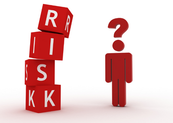 Building blocks spelling out "risk"