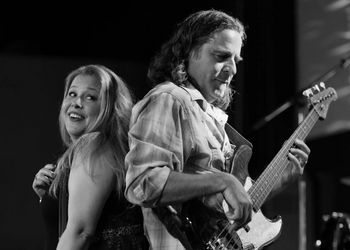 Mojomamma lead singer Jessica Rogalski with another band member on guitar