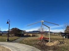 Shade installation over a bench at Founders Park.
