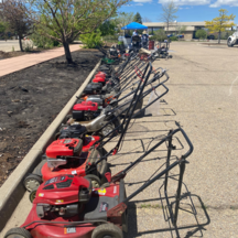 Gas lawnmowers lined up to be recycled