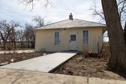 An older framed structure in the historic Grasso Park