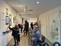 People looking at the superior elementary art exhibit