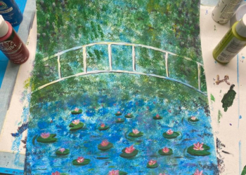 Painting of water lilies with a bridge