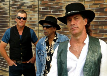 Three Johnny O Band members pose for the camera