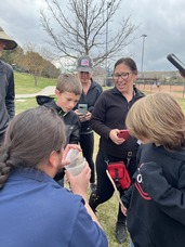 Volunteers releasing bees