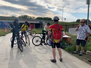 Bike commuters stop at a Superior station on Bike to Work Day in 2019