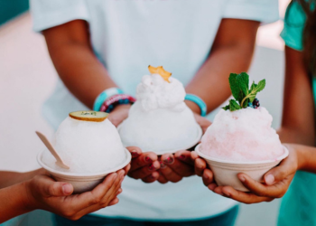 Punch Buggy Shaved ice. Closeup of 3 dishes of shaved ice topped with fruit.