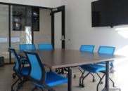 Table and chairs in a meeting room at the Superior Community Center