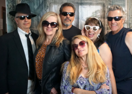 Steve & the Cruisers - six band members pose with sunglasses and attitude