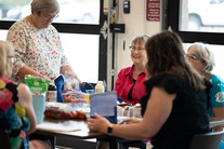 Seniors enjoy the brown bag lunch and speaker series at the Superior Community Center.