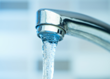 water coming out of a faucet