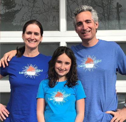 Family who owns Boulder Baked smiling for a photo