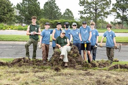 Boulder County Youth Corps members posing for the camera while working outside