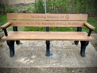 Memorial bench dedicated to the pets lost in the 2020 Marshall Fire