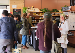 Shoppers browse inside Nude Foods Market