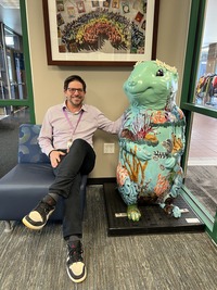 Superior Elementary School Principal Stein and a prairie dog sculpture