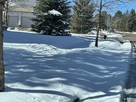 Snow on a sidewalk