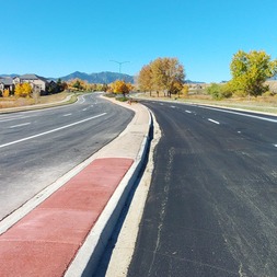 Coalton progress photo showing a partially completed road.