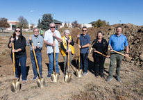 Superior Trustees and Historical Commission members with shovels at museum construction site