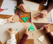 People work together to make holiday cards