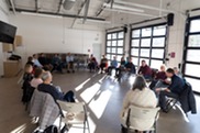 A group gathers at the Superior Community Center for First Fridays Coffee.