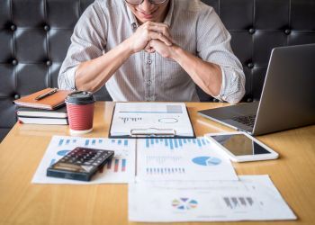 A person learns about investing