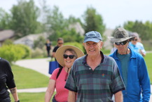 A Superior resident walks through the park during an event for seniors.