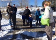 Participants walk with Ashley De Laup near Coyote Ridge open space