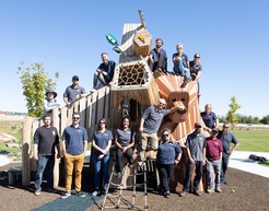 parks and rec team on playground