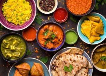 An assortment of Indian foods on a table