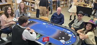 Boots & Bling participants play poker at the SCC