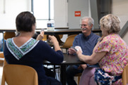 People play euchre at the Superior Community Center