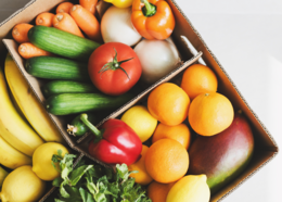 Local produce in a cardboard box