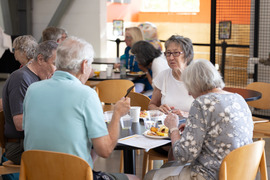 People enjoy the Senior Welcome Breakfast at the Superior Community Center