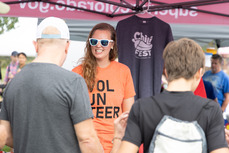 Volunteer at the info booth during the 2022 Chili and beer Fest.