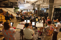 Unfinished Orchestra performs to a crowd at the Superior Community Center