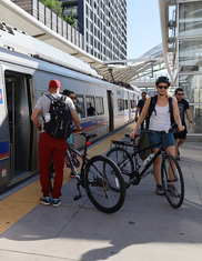 People getting on RTD train