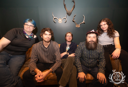 High Lonesome band members pose for a photo