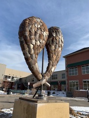 "Let Your Heart Soar" sculpture of wings by Mitch Levin