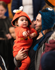 A kid and parent enjoy Monster Mash in 2023